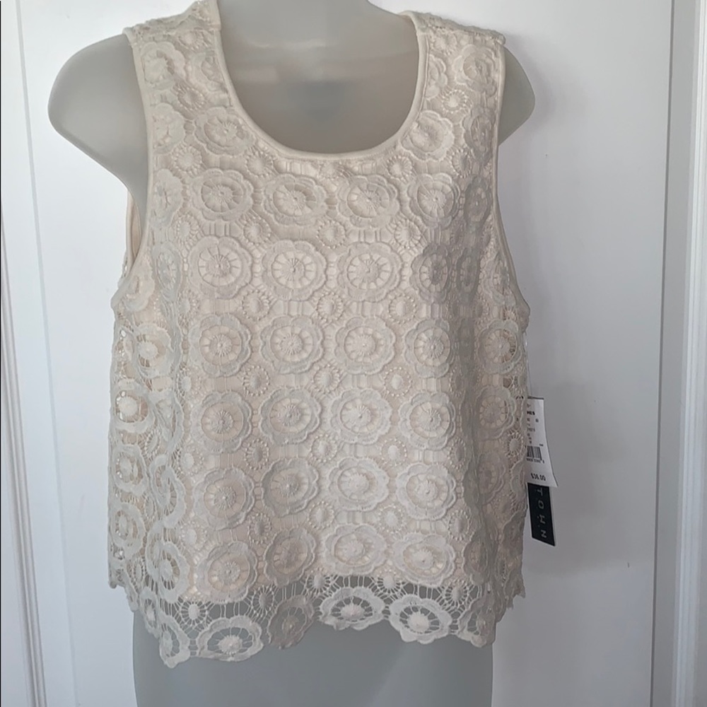 NWOT - tag lost during packing/moving houses. It is still NEW and not worn.